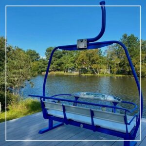Refinished ski chair lift by the water